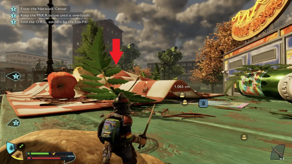 Step 11 - Head to the top of the red and white picnic tablecloth to find the Orc Transmitter location in Grounded 2.